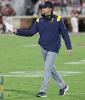 The decision for Neal Brown's future has no clear path